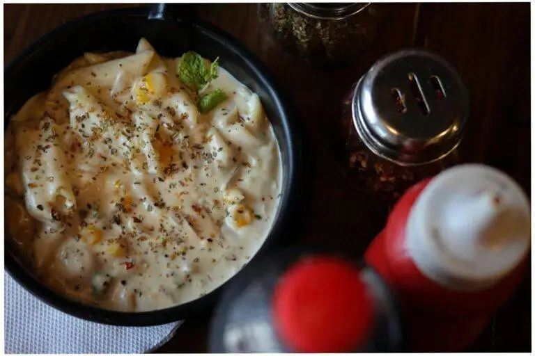 a bowl of macaroni and cheese on a table