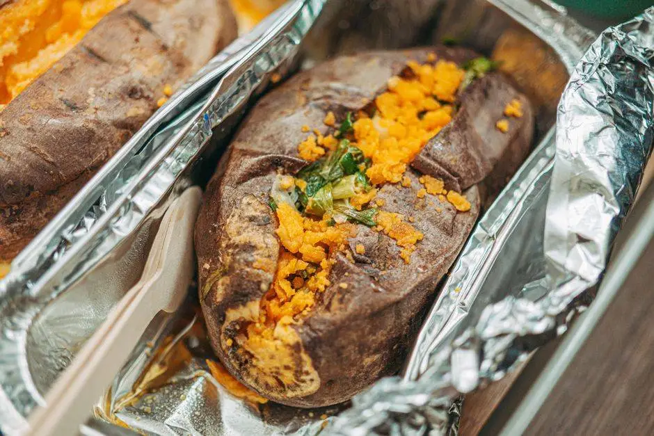 Close-up of a tasty baked sweet potato with toppings, perfect for food photography and culinary inspiration.